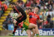 23 June 2013; Brendan McVeigh, Down, supported by team-mate Brendan McArdle, in action against Michael Murphy, Donegal. Ulster GAA Football Senior Championship Semi-Final, Donegal v Down, Kingspan Breffni Park, Cavan. Picture credit: Oliver McVeigh / SPORTSFILE