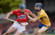 23 June 2013; Patrick Horgan, Cork, is tackled by David McInerney, Clare. Munster GAA Hurling Senior Championship Semi-Final, Cork v Clare, Gaelic Grounds, Limerick. Picture credit: Ray McManus / SPORTSFILE