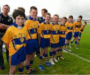 23 June 2013; Clare players taking part in the Primary Go Games form a guard of honour as the teams arrive out for the senior game. Munster GAA Hurling Senior Championship Semi-Final, Cork v Clare, Gaelic Grounds, Limerick.. Picture credit: Ray McManus / SPORTSFILE