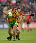 23 June 2013; Ryan Bradley, Donegal, in action against Keith Quinn, Down. Ulster GAA Football Senior Championship Semi-Final, Donegal v Down, Kingspan Breffni Park, Cavan. Picture credit: Oliver McVeigh / SPORTSFILE