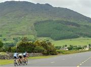 23 June 2013: Matt Brammeier, Champion Systems Pro Cycling Team, leads Philip Lavery, Amicale Cycliste Bisontine, and Philip Deignan, United Healthcare, on the approach to Carlingford during the Elite Men's Road Race National Championships. Carlingford, Co. Louth. Picture credit: Stephen McMahon / SPORTSFILE