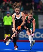 3 November 2019; Natalie Sourisseau of Canada in action against Sarah Hawkshaw of Ireland during the FIH Women's Olympic Qualifier match between Ireland and Canada at Energia Park in Dublin. Photo by Brendan Moran/Sportsfile