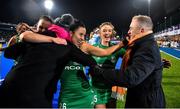 3 November 2019; Ireland players Lizzie Colvin, Anna O’Flanagan and Gillian Pinder celebrate with former Ireland international Kate Dillon and Colin Stewart after the FIH Women's Olympic Qualifier match between Ireland and Canada at Energia Park in Dublin. Photo by Brendan Moran/Sportsfile