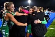 3 November 2019; Ireland players Chloe Watkins, left, Lizzie Colvin and Anna O’Flanagan celebrate with former Ireland international Kate Dillon and Colin Stewart after the FIH Women's Olympic Qualifier match between Ireland and Canada at Energia Park in Dublin. Photo by Brendan Moran/Sportsfile