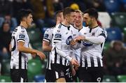 8 November 2019; Daniel Kelly of Dundalk, centre, celebrates with team-mates after scoring his side's first goal during the Unite the Union Champions Cup first leg match between Linfield and Dundalk at the National Football Stadium at Windsor Park in Belfast. Photo by Oliver McVeigh/Sportsfile