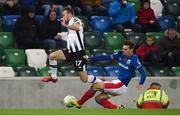 8 November 2019; Cameron Dummigan of Dundalk in action against Jimmy Callacher of Linfield during the Unite the Union Champions Cup first leg match between Linfield and Dundalk at the National Football Stadium at Windsor Park in Belfast. Photo by Oliver McVeigh/Sportsfile