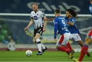 8 November 2019;  Chris Shields of Dundalk in action against Bastien Héry of Linfield during the Unite the Union Champions Cup first leg match between Linfield and Dundalk at the National Football Stadium at Windsor Park in Belfast. Photo by Oliver McVeigh/Sportsfile