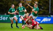 10 November 2019; Eimear Considine of Ireland is tackled by Alecs Donovan, left, and Paige Randall of Wales during the Women's Rugby International match between Ireland and Wales at the UCD Bowl in Dublin. Photo by David Fitzgerald/Sportsfile