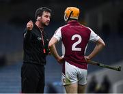10 November 2019; Referee Thomas Walsh speaks to Seamus Burke of Borris-Ileigh before issuing him a yellow card during the AIB Munster GAA Hurling Senior Club Championship Semi-Final match between Borris-Ileigh and Glen Rovers at Semple Stadium in Thurles, Tipperary. Photo by Ray McManus/Sportsfile