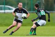 10 November 2019; William Hurley Jnr of Newcastle West in action against Luke Connolly of Nemo Rangers during the AIB Munster GAA Football Senior Club Championship Quarter-Final match between Nemo Rangers and Newcastle West at Mallow GAA Grounds in Mallow, Cork. Photo by Michael P Ryan/Sportsfile