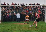 6 January 2019; Going, going, gone. Leitrim goalkeeper Diarmuid McKiernan shapes to dive left, Evan Regan shoots to the goalie’s right and the umpire is in the centre as Mayo win a penalty shoot-out amid high drama in Carrick-on-Shannon. The narrow win gets James Horan’s second stint as Mayo manager off to a successful start Photo by Stephen McCarthy/Sportsfile