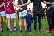 9 June 2019;  The inner circles. Senan Lawlor, aged three from Rosemount, joins a relaxed Westmeath team huddle following their routine qualifier win over Waterford United . Photo by Harry Murphy/Sportsfile