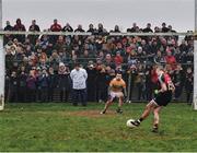 6 January 2019; Going, going, gone. Leitrim goalkeeper Diarmuid McKiernan shapes to dive left, Evan Regan shoots to the goalie’s right and the umpire is in the centre as Mayo win a penalty shoot-out amid high drama in Carrick-on-Shannon. The narrow win gets James Horan’s second stint as Mayo manager off to a successful start. Photo by Stephen McCarthy/Sportsfile. This image may be reproduced free of charge when used in conjunction with a review of the book &quot;A Season of Sundays 2019&quot;. All other usage © SPORTSFILE