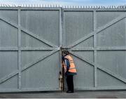 19 May 2019; Life on the far side of the gates. It’s not a day for the uncovered stand at Kingspan Breffni but these dedicated supporters are headed that way despite the downpour. Next day Bridgid Twohig, the long-serving Dublin GAA steward, acts as sentry guard waiting for the Dublin and Wexford teams to arrive at Parnell Park. Photo by Daire Brennan/Sportsfile.This image may be reproduced free of charge when used in conjunction with a review of the book &quot;A Season of Sundays 2019&quot;. All other usage © SPORTSFILE