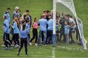 25 May 2019; Backstop. Dublin goalkeeper Stephen Cluxton is heading deeper into his own goal obliging supporters for selfies after his team’s 26-point demolition job on Louth.  Photo by Ray McManus/Sportsfile. This image may be reproduced free of charge when used in conjunction with a review of the book &quot;A Season of Sundays 2019&quot;. All other usage © SPORTSFILE