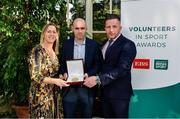 12 November 2019; James McLornan of St Comgalls CLG, Co. Antrim, is presented with their award by Mary O'Connor, CEO of the Federation of Irish Sport, and Richard Gernon, Regional Manager EBS, during the Volunteers in Sport Awards presented by Federation of Irish Sport with EBS at Farmleigh House in Phoenix Park, Dublin. Photo by Sam Barnes/Sportsfile