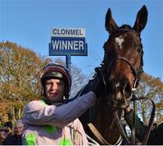 14 November 2019; Jockey Paul Townend celebrates in the winner's enclosure after winning the Clonmel Oil Steeplechase on Douvan at Clonmel Racecourse in Tipperary. Photo by Matt Browne/Sportsfile