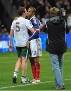 18 November 2009; Richard Dunne, Republic of Ireland, with theirry Henry, France, after the game. FIFA 2010 World Cup Qualifying Play-off 2nd Leg, Republic of Ireland v France, Stade de France, Saint-Denis, Paris, France. Picture credit: Stephen McCarthy / SPORTSFILE