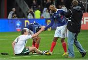 18 November 2009; Richard Dunne, Republic of Ireland, with Nicolas Anelka, France, after the game. FIFA 2010 World Cup Qualifying Play-off 2nd Leg, Republic of Ireland v France, Stade de France, Saint-Denis, Paris, France. Picture credit: Stephen McCarthy / SPORTSFILE