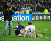 18 November 2009; Richard Dunne, Republic of Ireland, with theirry Henry, France, after the game. FIFA 2010 World Cup Qualifying Play-off 2nd Leg, Republic of Ireland v France, Stade de France, Saint-Denis, Paris, France. Picture credit: Stephen McCarthy / SPORTSFILE