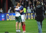 18 November 2009; Richard Dunne, Republic of Ireland, with theirry Henry, France, after the game. FIFA 2010 World Cup Qualifying Play-off 2nd Leg, Republic of Ireland v France, Stade de France, Saint-Denis, Paris, France. Picture credit: Stephen McCarthy / SPORTSFILE