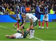 18 November 2009; Richard Dunne and Liam Lawrence, right, Republic of Ireland react after the game. FIFA 2010 World Cup Qualifying Play-off 2nd Leg, Republic of Ireland v France, Stade de France, Saint-Denis, Paris, France. Picture credit: Stephen McCarthy / SPORTSFILE