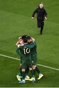 14 November 2019; Republic of Ireland players celebrate after Derrick Williams of Republic of Ireland scored their side's first goal as a young pitch invader runs on during the 3 International Friendly match between Republic of Ireland and New Zealand at the Aviva Stadium in Dublin. Photo by Ben McShane/Sportsfile