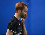 15 November 2019; Sam Magee of Ireland reacts after losing a point during his mixed doubles semi-final match against Anne Tran and Ronan Labar of France at the AIG FZ Forza Irish Open Badminton Championships at the National Indoor Arena in Abbotstown, Dublin. Photo by Seb Daly/Sportsfile