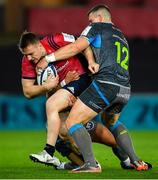 16 November 2019; Rory Scannell of Munster is tackled by Scott Williams, right, and Tiaan Thomas-Wheeler of Ospreys during the Heineken Champions Cup Pool 4 Round 1 match between Ospreys and Munster at Liberty Stadium in Swansea, Wales. Photo by Seb Daly/Sportsfile