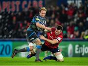 16 November 2019; Luke Price of Ospreys is tackled by Peter O’Mahony of Munster during the Heineken Champions Cup Pool 4 Round 1 match between Ospreys and Munster at Liberty Stadium in Swansea, Wales. Photo by Seb Daly/Sportsfile