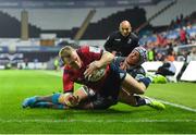 16 November 2019; Keith Earls of Munster dives over to score his side's second try, despite the tackle of Hanno Dirksen of Ospreys, during the Heineken Champions Cup Pool 4 Round 1 match between Ospreys and Munster at Liberty Stadium in Swansea, Wales. Photo by Seb Daly/Sportsfile
