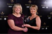 16 November 2019; Breda Kelly, right, accepts the Score of the Year award on behalf of her daughter, Mayo footballer, Niamh Kelly, from Marie Hickey, President, LGFA, during the TG4 All-Ireland Ladies Football All Stars Awards banquet, in association with Lidl at the Citywest Hotel in Saggart, Dublin. Photo by Brendan Moran/Sportsfile