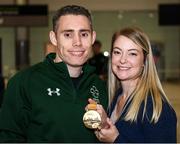 16 November 2019; T13 100m gold medalist Jason Smyth, from Derry, is greeted by his wife Elise, at Dublin Airport on Team Ireland's return from the World Para Athletics Championships 2019, held in Dubai. Photo by Stephen McCarthy/Sportsfile