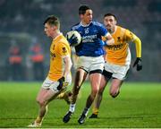 16 November 2019; Brendan McDyer of Naomh Conaill in action against Conor Doyle and Liam Savage of Clontibret during the AIB Ulster GAA Football Senior Club Championship Semi-Final match between Clontibret and Naomh Conaill at Healy Park in Omagh. Photo by Oliver McVeigh/Sportsfile