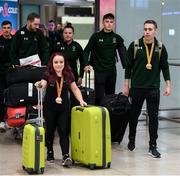 16 November 2019; Team Ireland athletes, including F41 Discus bronze medalist Niamh McCarthy, from Carrigaline, Cork, and T13 100m gold medalist Jason Smyth, from Derry, at Dublin Airport on their return from the World Para Athletics Championships 2019, held in Dubai. Photo by Stephen McCarthy/Sportsfile