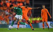 16 November 2019; Jamal Lewis of Northern Ireland in action against Quincy Promes of Netherlands during the UEFA EURO2020 Qualifier - Group C match between Northern Ireland and Netherlands at the National Football Stadium at Windsor Park in Belfast. Photo by David Fitzgerald/Sportsfile