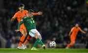 16 November 2019; Steven Davis of Northern Ireland in action against Marten de Roon of Netherlands during the UEFA EURO2020 Qualifier - Group C match between Northern Ireland and Netherlands at the National Football Stadium at Windsor Park in Belfast. Photo by David Fitzgerald/Sportsfile