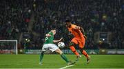 16 November 2019; Quincy Promes of Netherlands in action against Gavin Whyte of Northern Ireland during the UEFA EURO2020 Qualifier - Group C match between Northern Ireland and Netherlands at the National Football Stadium at Windsor Park in Belfast. Photo by David Fitzgerald/Sportsfile