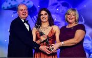 16 November 2019; Niamh Collins of Dublin is presented with her TG4 All Star award by Ard Stiúrthóir TG4, Alan Esslemont and President of LGFA Marie Hickey during the TG4 All-Ireland Ladies Football All Stars Awards banquet, in association with Lidl, at the Citywest Hotel in Saggart, Dublin. Photo by Brendan Moran/Sportsfile