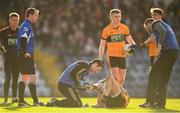 17 November 2019; Barry Shanahan of Austin Stacks is attended to by medical staff after sustaining an injury during the AIB Munster GAA Football Senior Club Championship semi-final match between Nemo Rangers and Austin Stacks at Páirc Ui Rinn in Cork. Photo by Eóin Noonan/Sportsfile