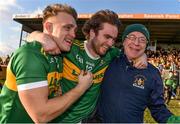 17 November 2019; Kevin Fahey, left, and Ross Peters of Clonmel Commercials, celebrate with Clonmel Commercials supporter Joe McNamara, right, following the AIB Munster GAA Football Senior Club Championship semi-final match between St. Joseph’s Miltown Malbay and Clonmel Commercials at Hennessy Memorial Park in Miltown Malbay, Clare. Photo by Sam Barnes/Sportsfile