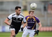 17 November 2019; Ryan Johnston of Kilcoo in action against  Jack Love of Derrygonnelly during the AIB Ulster GAA Football Senior Club Championship semi-final match between Kilcoo and Derrygonnelly at the Athletic Grounds in Armagh. Photo by Oliver McVeigh/Sportsfile