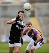 17 November 2019; Ryan Johnston of Kilcoo in action against Jack Love of Derrygonnelly during the AIB Ulster GAA Football Senior Club Championship semi-final match between Kilcoo and Derrygonnelly at the Athletic Grounds in Armagh. Photo by Oliver McVeigh/Sportsfile