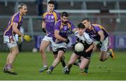 17 November 2019; Anthony Morgan of Kilcoo in action against Kevin Cassidy , Declan Cassidy and Ryan Jones of Derrygonnelly during the AIB Ulster GAA Football Senior Club Championship semi-final match between Kilcoo and Derrygonnelly at the Athletic Grounds in Armagh. Photo by Oliver McVeigh/Sportsfile