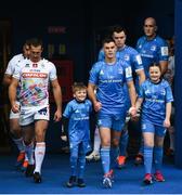 16 November 2019; Matchday mascots 9 year old Elijah Monahan, from Booterstown, Dublin, and 12 year old Theodora McDonnell, from Ranelagh, Dublin, with Leinster captain Jonathan Sexton ahead of the Heineken Champions Cup Pool 1 Round 1 match between Leinster and Benetton at the RDS Arena in Dublin. Photo by Ramsey Cardy/Sportsfile