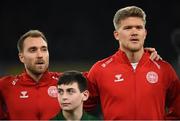 18 November 2019; Christian Eriksen, left, and Andreas Cornelius of Denmark during the Danish national anthem ahead of the UEFA EURO2020 Qualifier match between Republic of Ireland and Denmark at the Aviva Stadium in Dublin. Photo by Eóin Noonan/Sportsfile