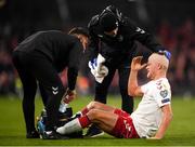 18 November 2019; Andreas Cornelius of Denmark reveives treatment after a head injury during the UEFA EURO2020 Qualifier match between Republic of Ireland and Denmark at the Aviva Stadium in Dublin. Photo by Harry Murphy/Sportsfile