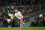 18 November 2019; David McGoldrick of Republic of Ireland takes a shot under pressure from Lasse Schöne of Denmark during the UEFA EURO2020 Qualifier match between Republic of Ireland and Denmark at the Aviva Stadium in Dublin. Photo by Seb Daly/Sportsfile