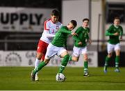19 November 2019; Adam Murphy of Republic of Ireland in action against Konrad Magnuszewki of Poland during the U15 International Friendly match between Republic of Ireland and Poland at Eamonn Deacy Park in Galway. Photo by Seb Daly/Sportsfile