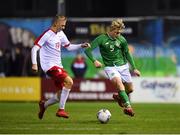 19 November 2019; Sam Curtis of Republic of Ireland in action against Marcel Szymanski of Poland during the U15 International Friendly match between Republic of Ireland and Poland at Eamonn Deacy Park in Galway. Photo by Seb Daly/Sportsfile